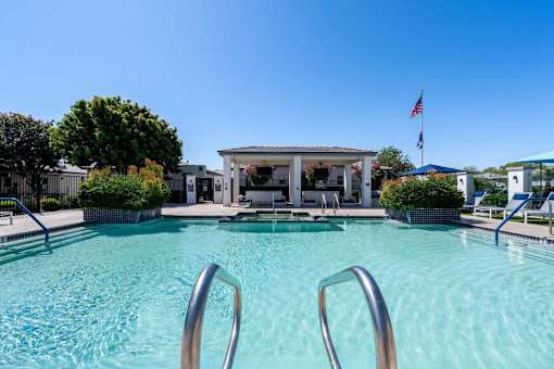 Resort style pool with covered pavilion at Vistoria On Greenway Apartments, Surprise, AZ 85379