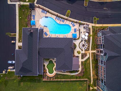 an aerial view of community with apartment buildings and a pool at Annandale Apartment Homes, Murfreesboro, TN
