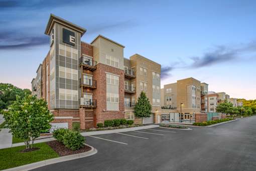 Exterior View at Dusk at The Enclave Luxury Apartments