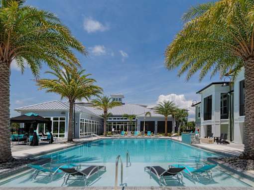 the swimming pool at the resort at longboat key club at The Addison on Long Bayou Apartments, Seminole, 33772
