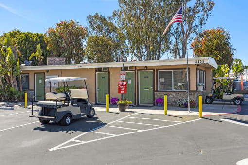 a building with a golf cart parked in front of it