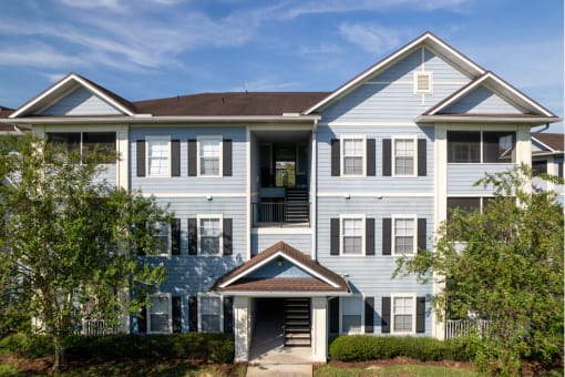 exterior building view of apartment complex at Magnolia Village Apartments, Jacksonville, FL