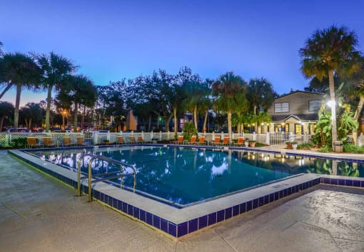 Pool View In Night at Somerset Apartments in Largo, FL