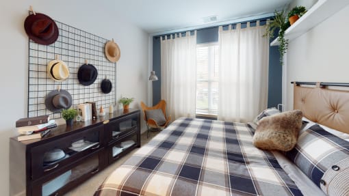 a bedroom with a bed in a room at The Bend Arbordale, Virginia