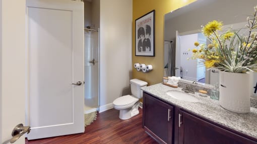 a bathroom with a toilet sink and shower at The Bend Arbordale, Williamsburg, VA, 23188