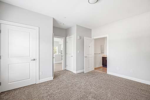 A white door is on the left side of the image.