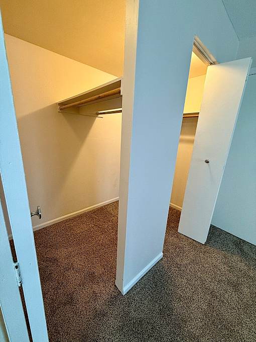 a walk in closet at Hidden Brook Apartment Homes Apartments, New Bedford, MA
