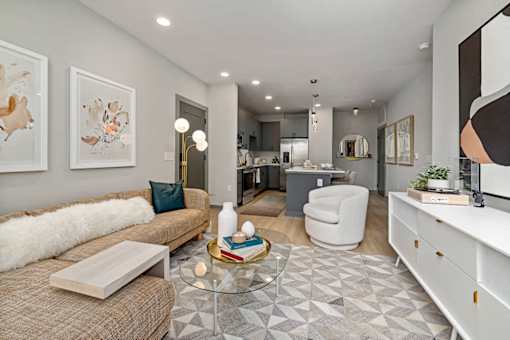 a living room with a couch and a table