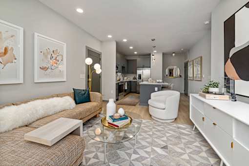 a living room with a couch and a table