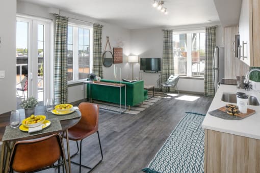 Staged interior with view of dining and living