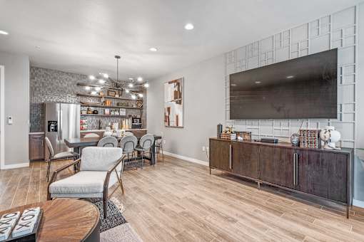 the reserve at bucklin hill clubhouse resident lounge with tv and dining area