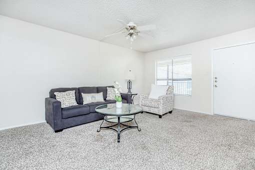 a living room with a couch and a coffee table