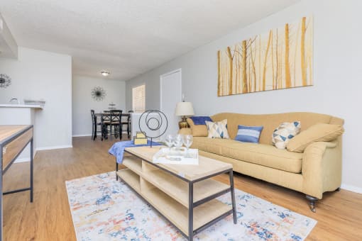 a living room with a couch and a table