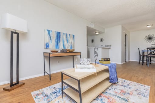 a living room with a couch and a table