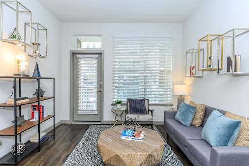 a living room with a couch and a coffee table