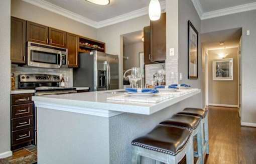a large kitchen with a counter top