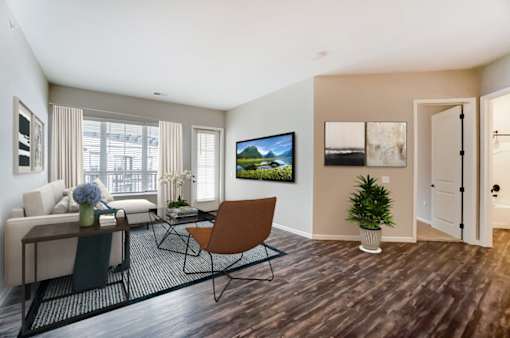 a living room with a tv on the wall at Essex, Columbus, Ohio, 43212