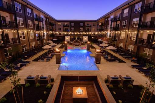 an aerial view of a swimming pool in the middle of an apartment buildingat Taylor House Apartments, Columbus, OH, 43214