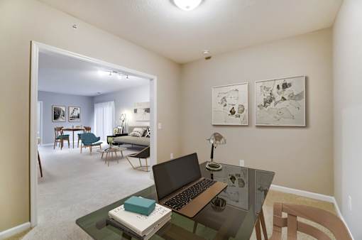 a home office with a laptop computer on a deskat Taylor House Apartments, Columbus, Ohio