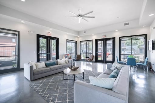a large living room with couches and a coffee table