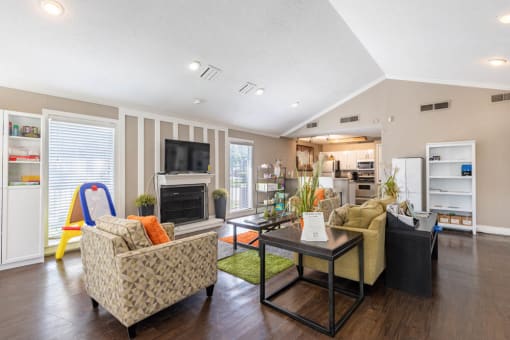room with a couch and a table at Tall Timbers Apartments, Houston, 77015