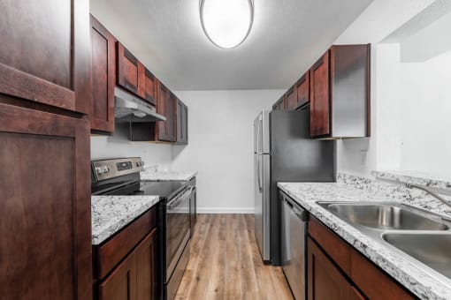 kitchen with stainless steel appliances at Tall Timbers Apartments, Texas, 77015