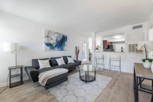 living room with a couch at Tall Timbers Apartments, Houston, TX