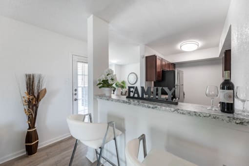bar and a kitchen at Tall Timbers Apartments, Houston, TX