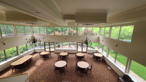 community room with tables and chairs