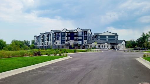 a large building with a road in front of it