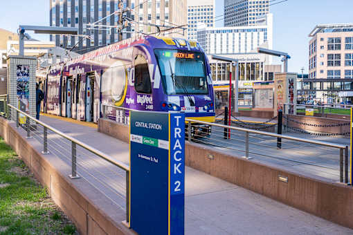 A train on the Green Line tracks at a station.