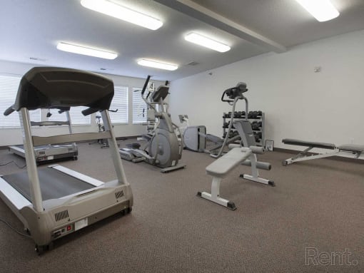 a gym with weights and other exercise equipment