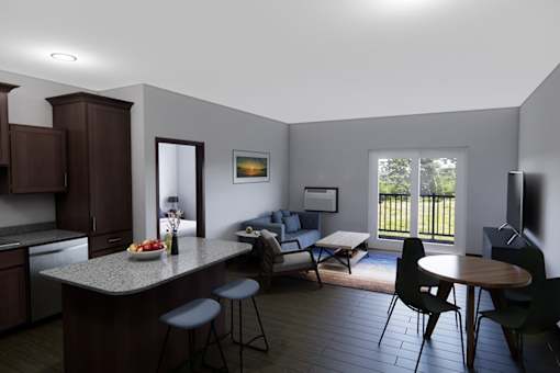 A kitchen with a table and chairs.