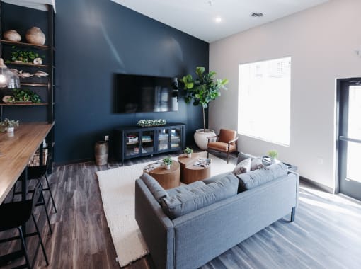 a living room with a couch and a tv