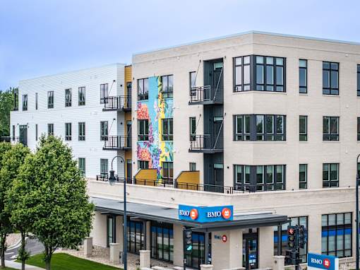 A modern building with a BMO bank branch in front at Bloom, Monona, WI