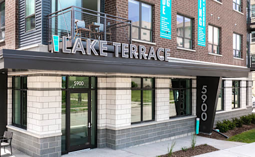 The front of a building with the name Lake Terrace on it.