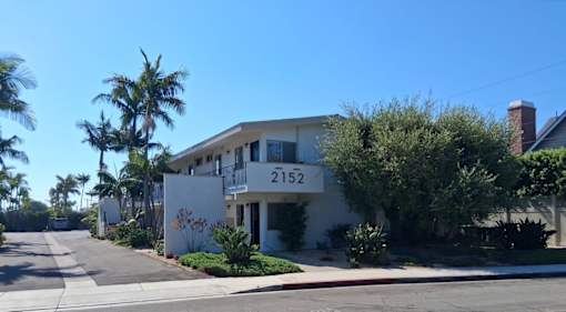 A white house with the number 2152 on it.