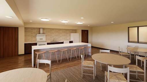 A modern kitchen with a dining table and chairs.