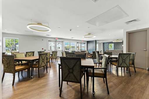 A room with tables and chairs.