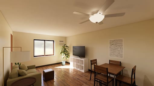 A living room with a couch, a television, a table, and chairs.