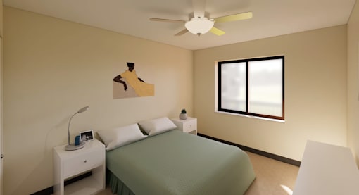 A bedroom with a bed, nightstand, and a ceiling fan.