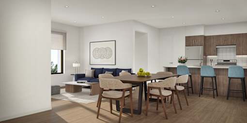 A modern dining room with a wooden table and chairs.