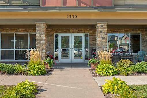 The front of a building with the number 1730 on it.