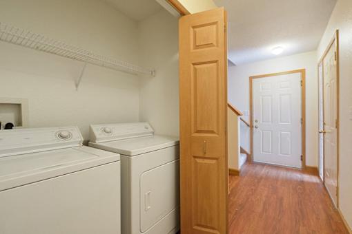 A laundry room with a washer and dryer.