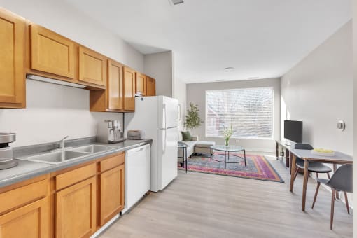 our apartments offer a kitchen and living room with a large window
