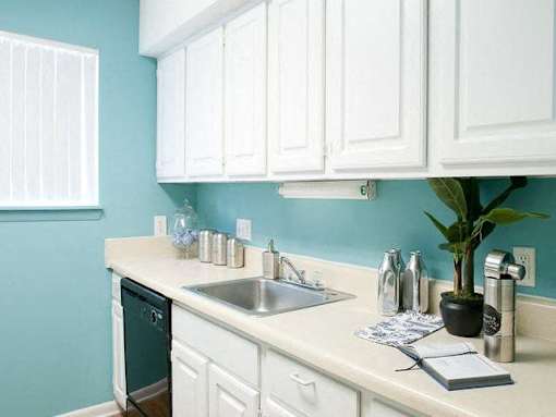 White cabinet kitchen at Emory Woods Apartments, Durham, NC.