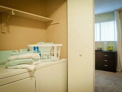In-unit laundry at Emory Woods Apartments, Durham, NC.