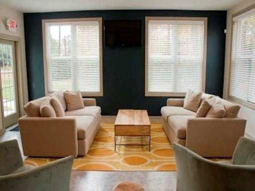 Living room with two couches at Emory Woods Apartments, Durham, NC, 28205..