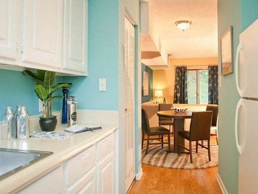 White kitchen at Emory Woods Apartments, Durham, NC, 28205.