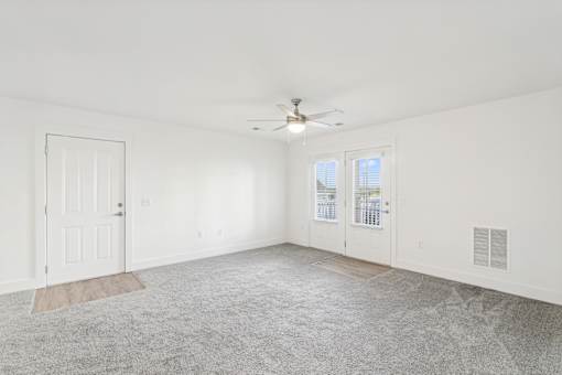 A spacious room with a ceiling fan  at The Parker North Augusta, North Augusta, SC, 29841